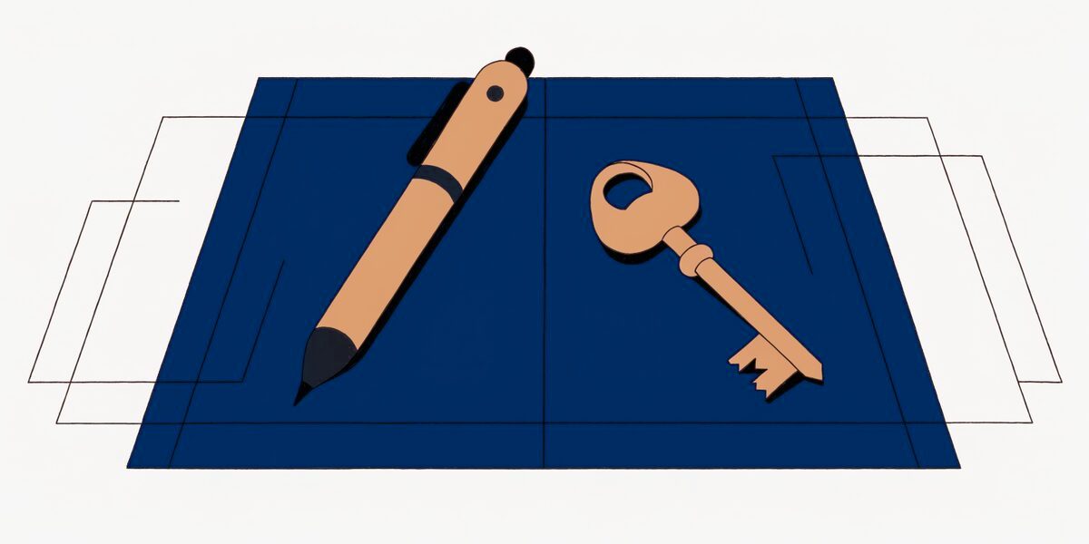 Un document vierge, un stylo et une clé posés sur un bureau, vus de dessus